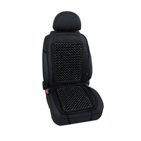 Evoluzione Kissen aus schwarzen Holzperlen